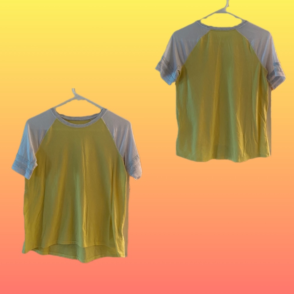 I am giving away a cute yellow T-shirt that is very soft.